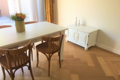 Great looking '60 chairs go well with the modern off-white table and cabinet